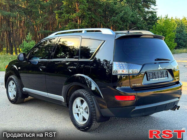 Чорний Міцубісі Аутлендер, об'ємом двигуна 2.4 л та пробігом 171 тис. км за 8999 $, фото 5 на Automoto.ua