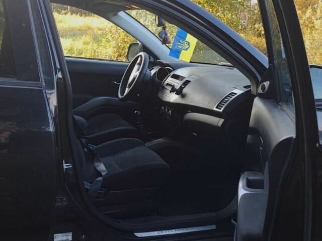 Чорний Міцубісі Аутлендер, об'ємом двигуна 2 л та пробігом 259 тис. км за 3900 $, фото 4 на Automoto.ua