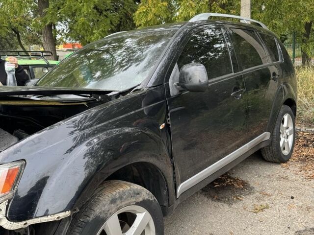 Черный Мицубиси Аутлендер, объемом двигателя 2.4 л и пробегом 246 тыс. км за 2600 $, фото 5 на Automoto.ua