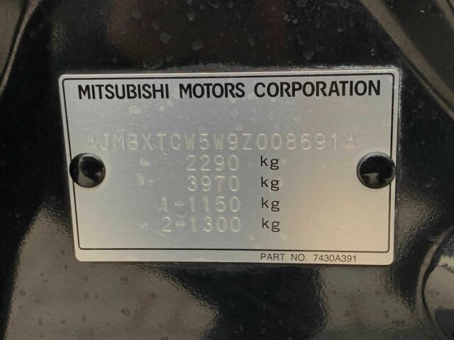 Черный Мицубиси Аутлендер, объемом двигателя 2.4 л и пробегом 175 тыс. км за 10499 $, фото 21 на Automoto.ua