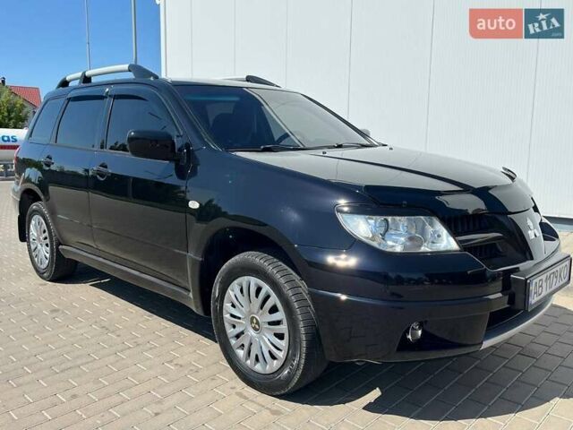 Черный Мицубиси Аутлендер, объемом двигателя 2 л и пробегом 236 тыс. км за 6699 $, фото 8 на Automoto.ua