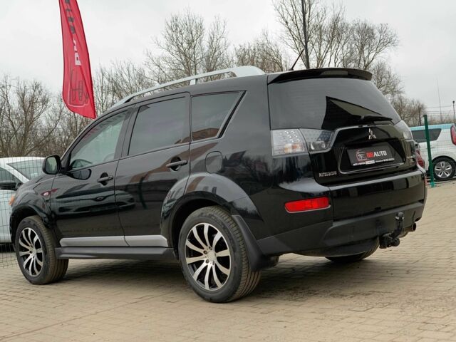 Черный Мицубиси Аутлендер, объемом двигателя 2.4 л и пробегом 175 тыс. км за 10499 $, фото 6 на Automoto.ua