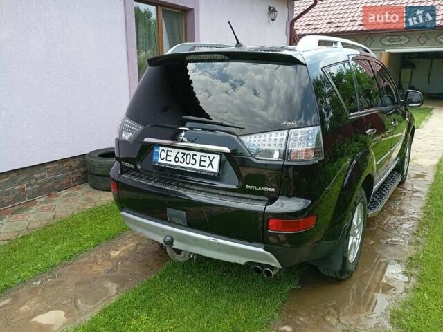 Черный Мицубиси Аутлендер, объемом двигателя 2.2 л и пробегом 279 тыс. км за 11000 $, фото 3 на Automoto.ua