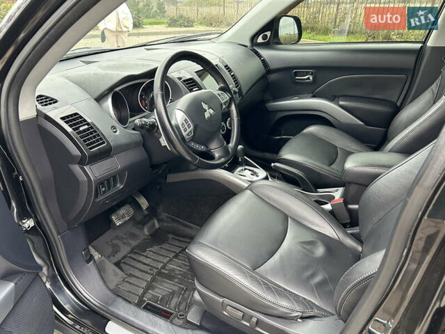 Черный Мицубиси Аутлендер, объемом двигателя 3 л и пробегом 77 тыс. км за 11800 $, фото 8 на Automoto.ua