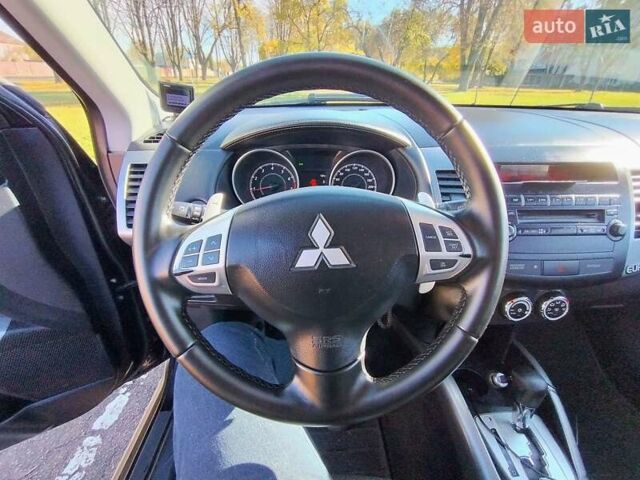 Міцубісі Аутлендер 2009 у Житомирі на Automoto.ua Чорний Міцубісі Аутлендер, об'ємом двигуна 2 л та пробігом 251 тис. км за 8400 $, фото 12 на Automoto.ua