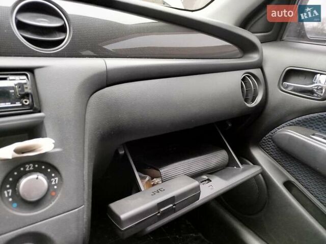 Чорний Міцубісі Аутлендер, об'ємом двигуна 2.38 л та пробігом 149 тис. км за 8800 $, фото 16 на Automoto.ua