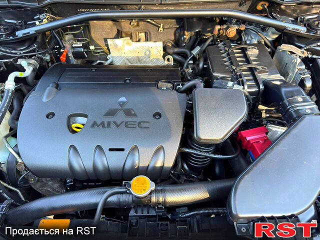 Чорний Міцубісі Аутлендер, об'ємом двигуна 2.4 л та пробігом 171 тис. км за 8999 $, фото 12 на Automoto.ua