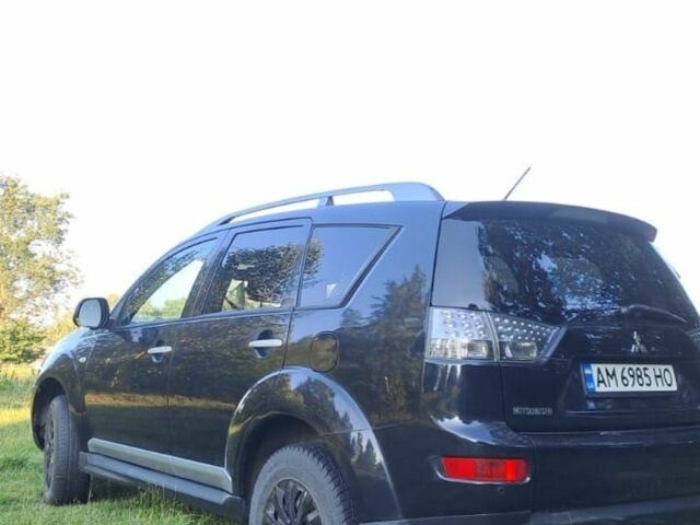 Чорний Міцубісі Аутлендер, об'ємом двигуна 2 л та пробігом 259 тис. км за 3900 $, фото 1 на Automoto.ua