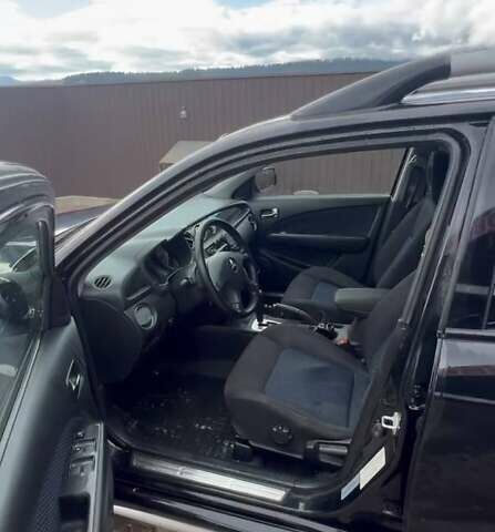 Черный Мицубиси Аутлендер, объемом двигателя 2.38 л и пробегом 220 тыс. км за 7500 $, фото 7 на Automoto.ua