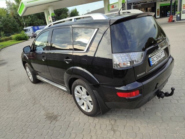 Черный Мицубиси Аутлендер, объемом двигателя 2 л и пробегом 104 тыс. км за 9900 $, фото 7 на Automoto.ua