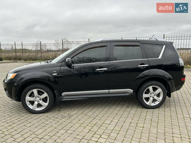 Черный Мицубиси Аутлендер, объемом двигателя 3 л и пробегом 77 тыс. км за 11800 $, фото 5 на Automoto.ua