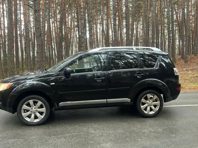 Черный Мицубиси Аутлендер, объемом двигателя 2 л и пробегом 280 тыс. км за 4500 $, фото 2 на Automoto.ua