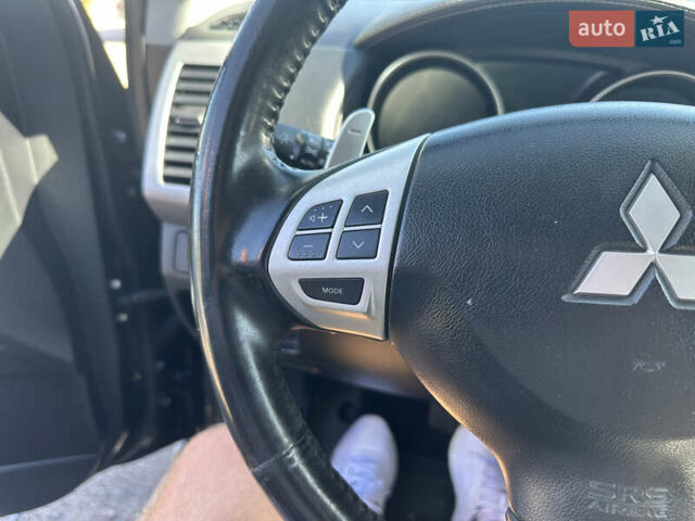 Черный Мицубиси Аутлендер, объемом двигателя 2 л и пробегом 240 тыс. км за 10999 $, фото 36 на Automoto.ua