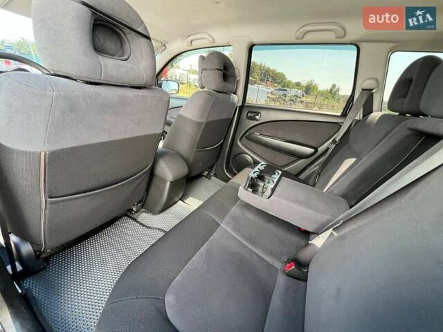 Черный Мицубиси Аутлендер, объемом двигателя 2 л и пробегом 236 тыс. км за 6699 $, фото 15 на Automoto.ua