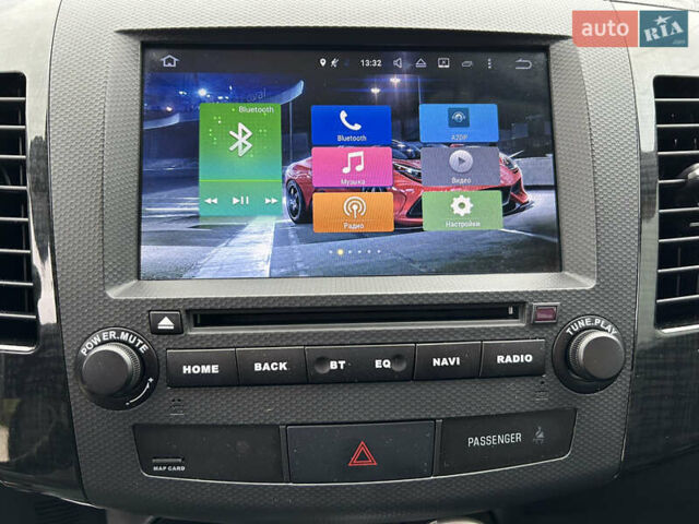 Черный Мицубиси Аутлендер, объемом двигателя 3 л и пробегом 77 тыс. км за 11800 $, фото 29 на Automoto.ua