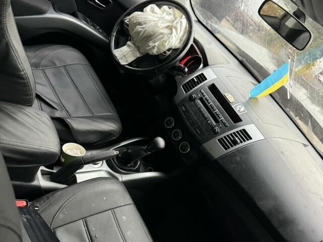 Черный Мицубиси Аутлендер, объемом двигателя 2.4 л и пробегом 246 тыс. км за 2600 $, фото 3 на Automoto.ua