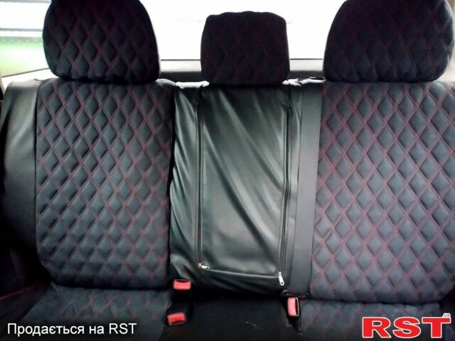 Черный Мицубиси Аутлендер, объемом двигателя 2 л и пробегом 280 тыс. км за 5800 $, фото 6 на Automoto.ua