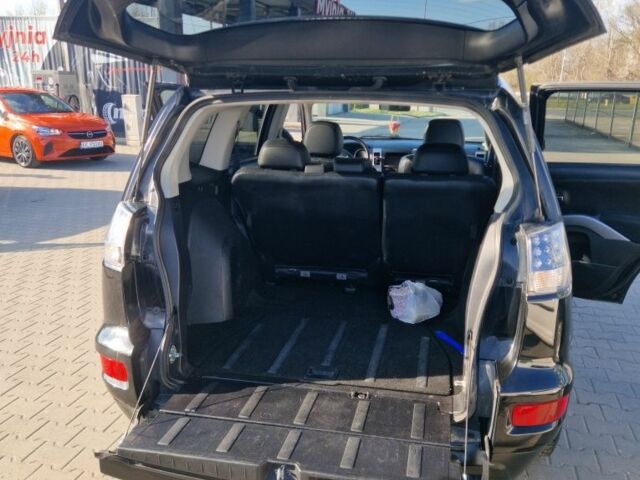 Чорний Міцубісі Аутлендер, об'ємом двигуна 2 л та пробігом 310 тис. км за 9800 $, фото 2 на Automoto.ua