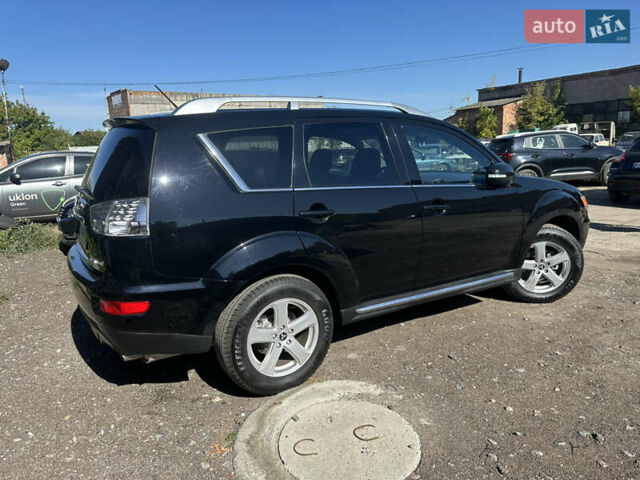 Черный Мицубиси Аутлендер, объемом двигателя 2 л и пробегом 240 тыс. км за 10999 $, фото 13 на Automoto.ua