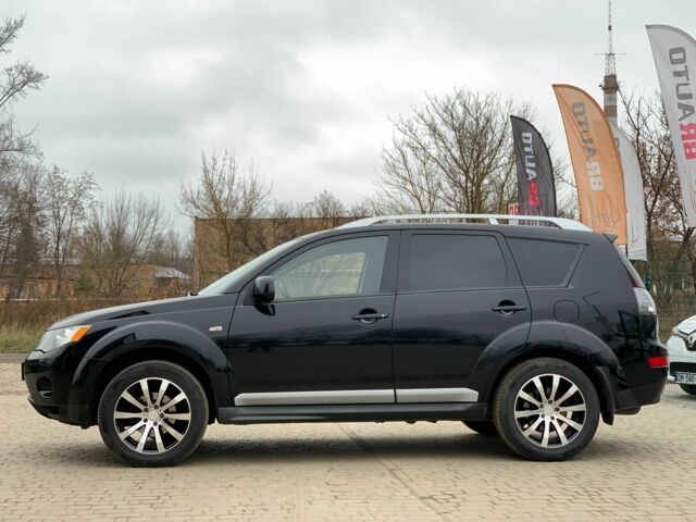 Черный Мицубиси Аутлендер, объемом двигателя 2.4 л и пробегом 175 тыс. км за 10499 $, фото 3 на Automoto.ua