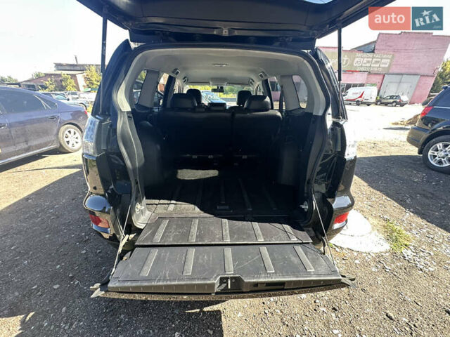 Черный Мицубиси Аутлендер, объемом двигателя 2 л и пробегом 240 тыс. км за 10999 $, фото 26 на Automoto.ua