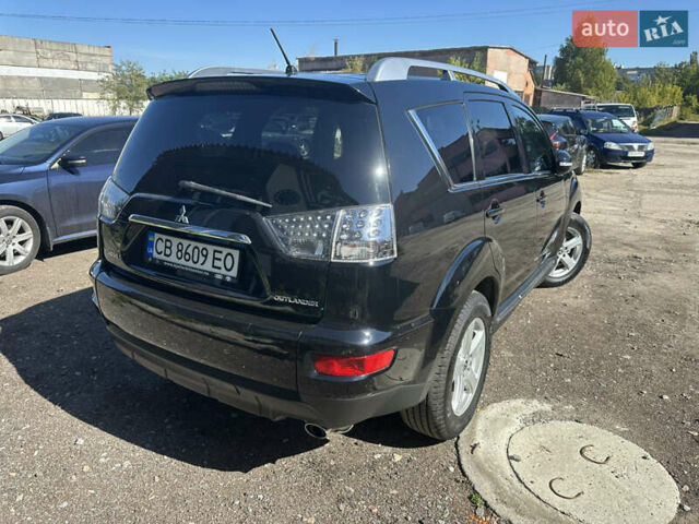 Черный Мицубиси Аутлендер, объемом двигателя 2 л и пробегом 240 тыс. км за 10999 $, фото 10 на Automoto.ua