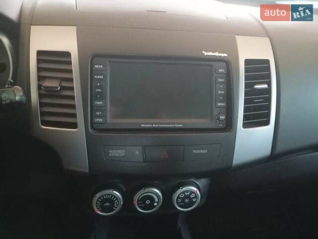 Черный Мицубиси Аутлендер, объемом двигателя 2.2 л и пробегом 279 тыс. км за 11000 $, фото 16 на Automoto.ua