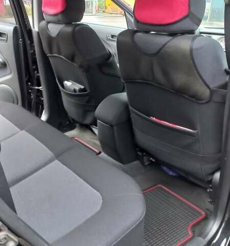 Черный Мицубиси Аутлендер, объемом двигателя 2 л и пробегом 73 тыс. км за 9500 $, фото 24 на Automoto.ua