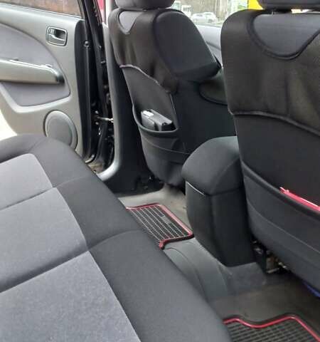 Черный Мицубиси Аутлендер, объемом двигателя 2 л и пробегом 73 тыс. км за 9500 $, фото 21 на Automoto.ua