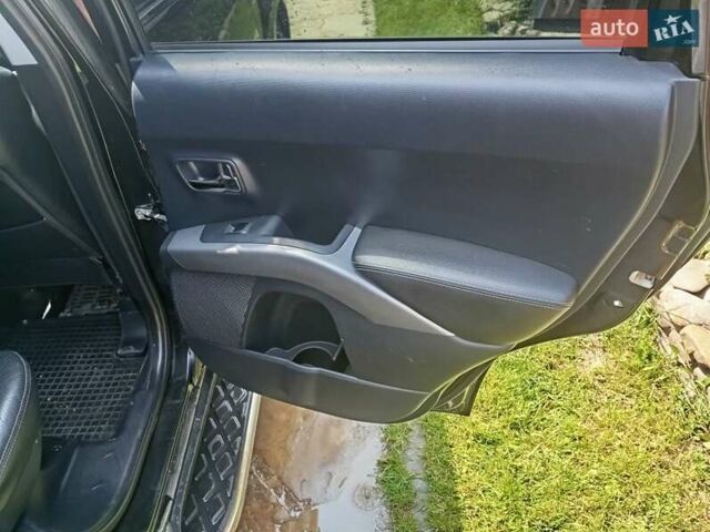 Черный Мицубиси Аутлендер, объемом двигателя 2.2 л и пробегом 279 тыс. км за 11000 $, фото 9 на Automoto.ua