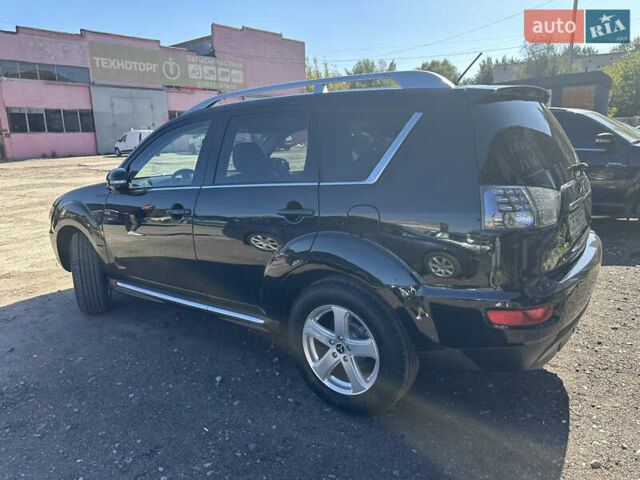 Черный Мицубиси Аутлендер, объемом двигателя 2 л и пробегом 240 тыс. км за 10999 $, фото 6 на Automoto.ua