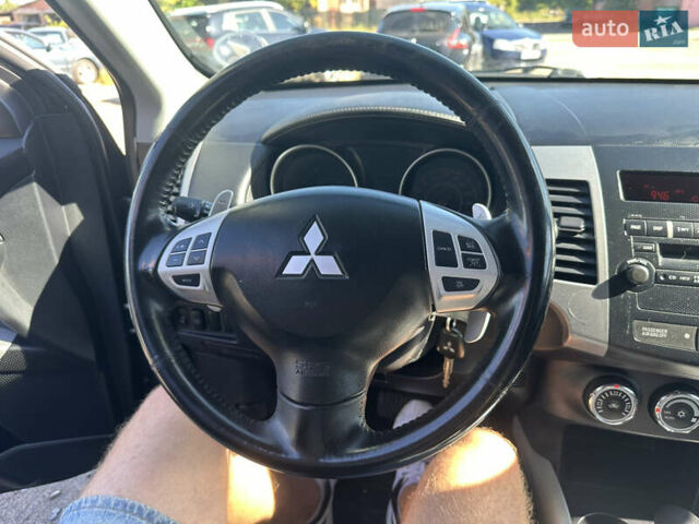 Черный Мицубиси Аутлендер, объемом двигателя 2 л и пробегом 240 тыс. км за 10999 $, фото 35 на Automoto.ua