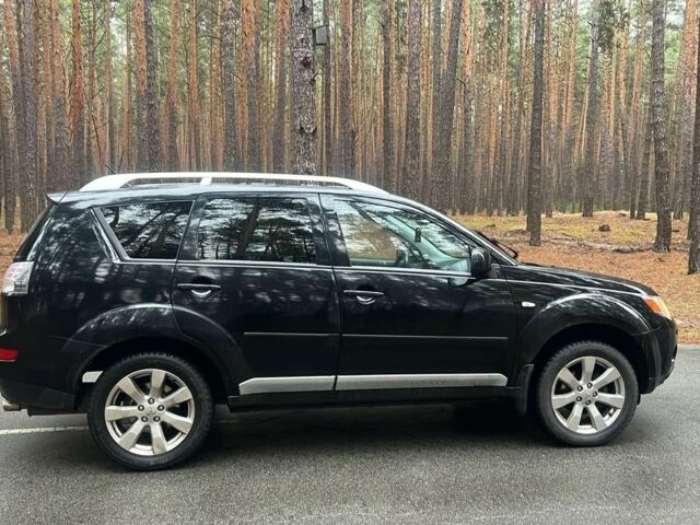 Черный Мицубиси Аутлендер, объемом двигателя 2 л и пробегом 280 тыс. км за 4500 $, фото 7 на Automoto.ua