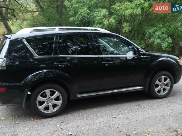 Чорний Міцубісі Аутлендер, об'ємом двигуна 2 л та пробігом 220 тис. км за 10700 $, фото 3 на Automoto.ua