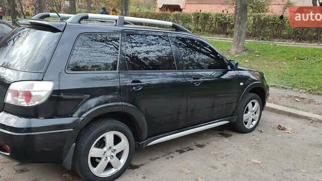 Чорний Міцубісі Аутлендер, об'ємом двигуна 2 л та пробігом 160 тис. км за 8500 $, фото 9 на Automoto.ua