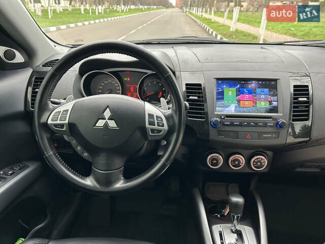 Черный Мицубиси Аутлендер, объемом двигателя 3 л и пробегом 77 тыс. км за 11800 $, фото 31 на Automoto.ua