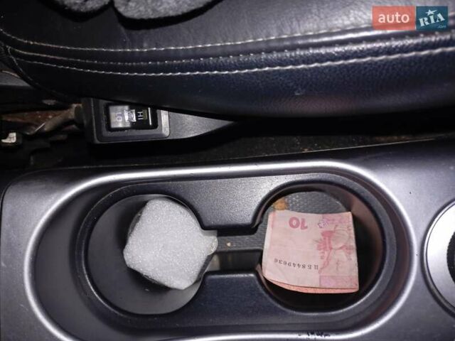Черный Мицубиси Аутлендер, объемом двигателя 2.2 л и пробегом 279 тыс. км за 11000 $, фото 18 на Automoto.ua