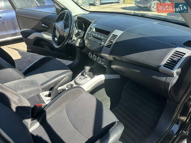 Черный Мицубиси Аутлендер, объемом двигателя 2 л и пробегом 240 тыс. км за 10999 $, фото 27 на Automoto.ua