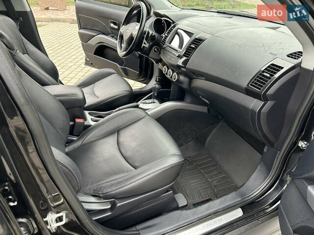 Черный Мицубиси Аутлендер, объемом двигателя 3 л и пробегом 77 тыс. км за 11800 $, фото 20 на Automoto.ua