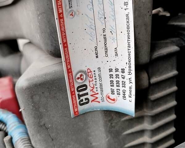 Чорний Міцубісі Аутлендер, об'ємом двигуна 2.38 л та пробігом 149 тис. км за 8800 $, фото 13 на Automoto.ua