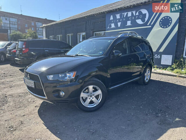 Черный Мицубиси Аутлендер, объемом двигателя 2 л и пробегом 240 тыс. км за 10999 $, фото 3 на Automoto.ua