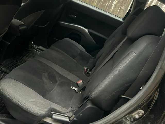 Черный Мицубиси Аутлендер, объемом двигателя 2 л и пробегом 280 тыс. км за 4500 $, фото 8 на Automoto.ua