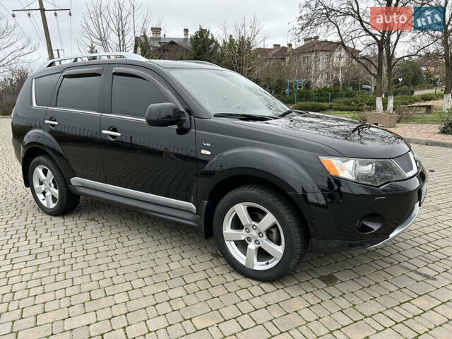 Черный Мицубиси Аутлендер, объемом двигателя 3 л и пробегом 77 тыс. км за 11800 $, фото 6 на Automoto.ua