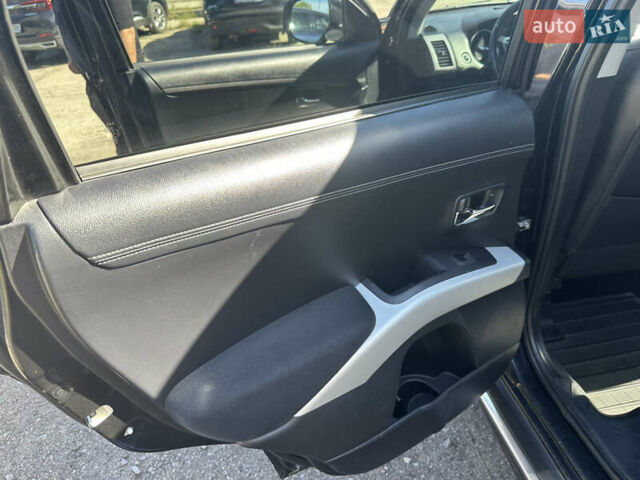 Черный Мицубиси Аутлендер, объемом двигателя 2 л и пробегом 240 тыс. км за 10999 $, фото 23 на Automoto.ua