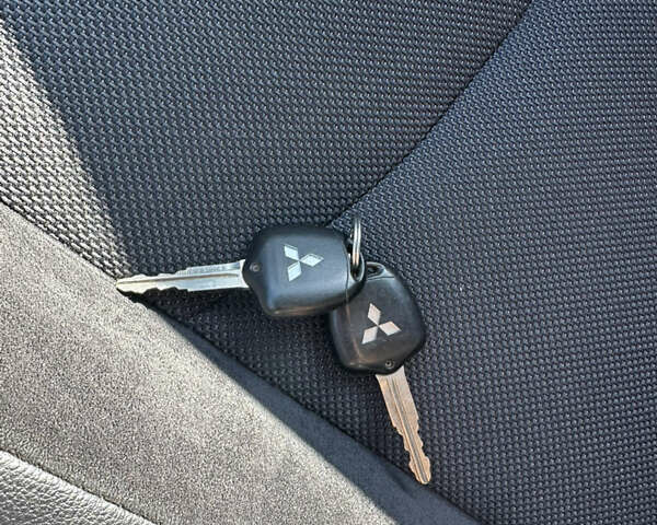 Черный Мицубиси Аутлендер, объемом двигателя 2 л и пробегом 240 тыс. км за 10999 $, фото 45 на Automoto.ua