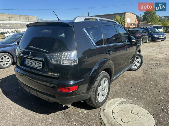 Черный Мицубиси Аутлендер, объемом двигателя 2 л и пробегом 240 тыс. км за 10999 $, фото 11 на Automoto.ua