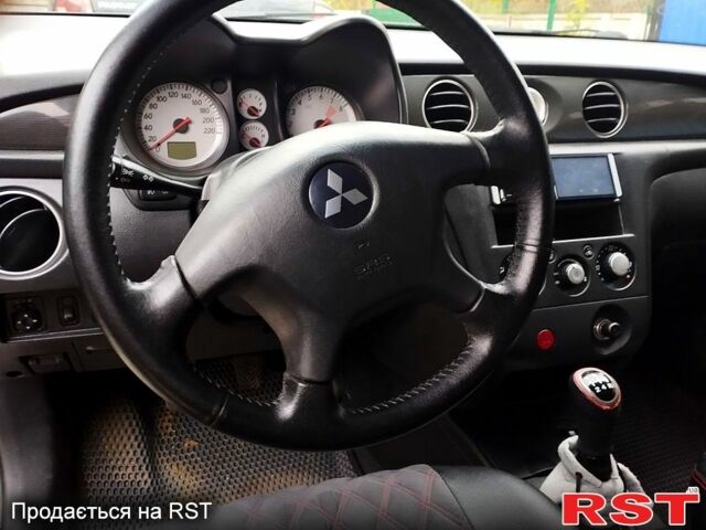 Черный Мицубиси Аутлендер, объемом двигателя 2 л и пробегом 280 тыс. км за 5800 $, фото 7 на Automoto.ua