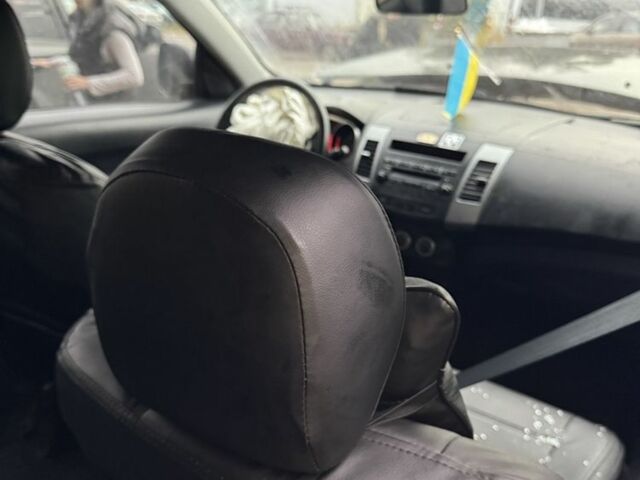 Черный Мицубиси Аутлендер, объемом двигателя 2.4 л и пробегом 246 тыс. км за 2600 $, фото 2 на Automoto.ua