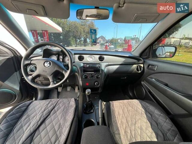 Черный Мицубиси Аутлендер, объемом двигателя 2 л и пробегом 236 тыс. км за 6699 $, фото 18 на Automoto.ua