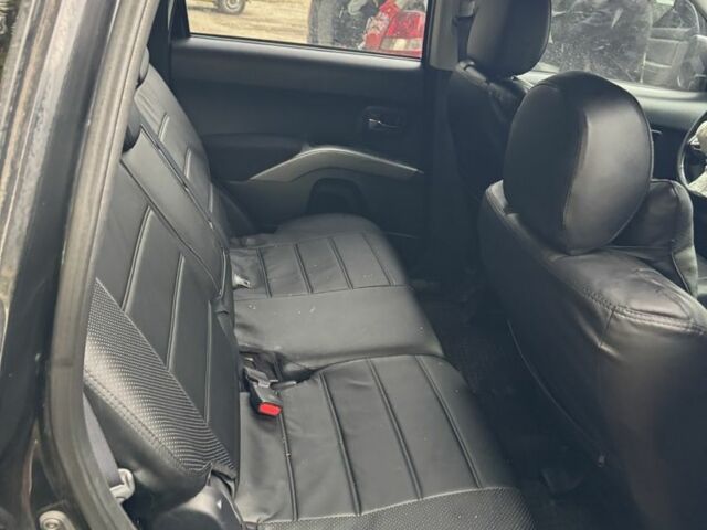 Черный Мицубиси Аутлендер, объемом двигателя 2.4 л и пробегом 246 тыс. км за 2600 $, фото 4 на Automoto.ua